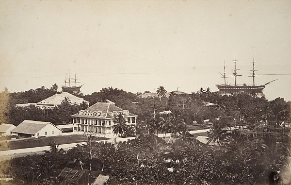 Palace of Queen Pomare IV in front of the French Governor’s residence in Papeéte, with the French Naval Frigate, L’Astrée, at anchor, by photographer Paul-Émile Miot, c1869
